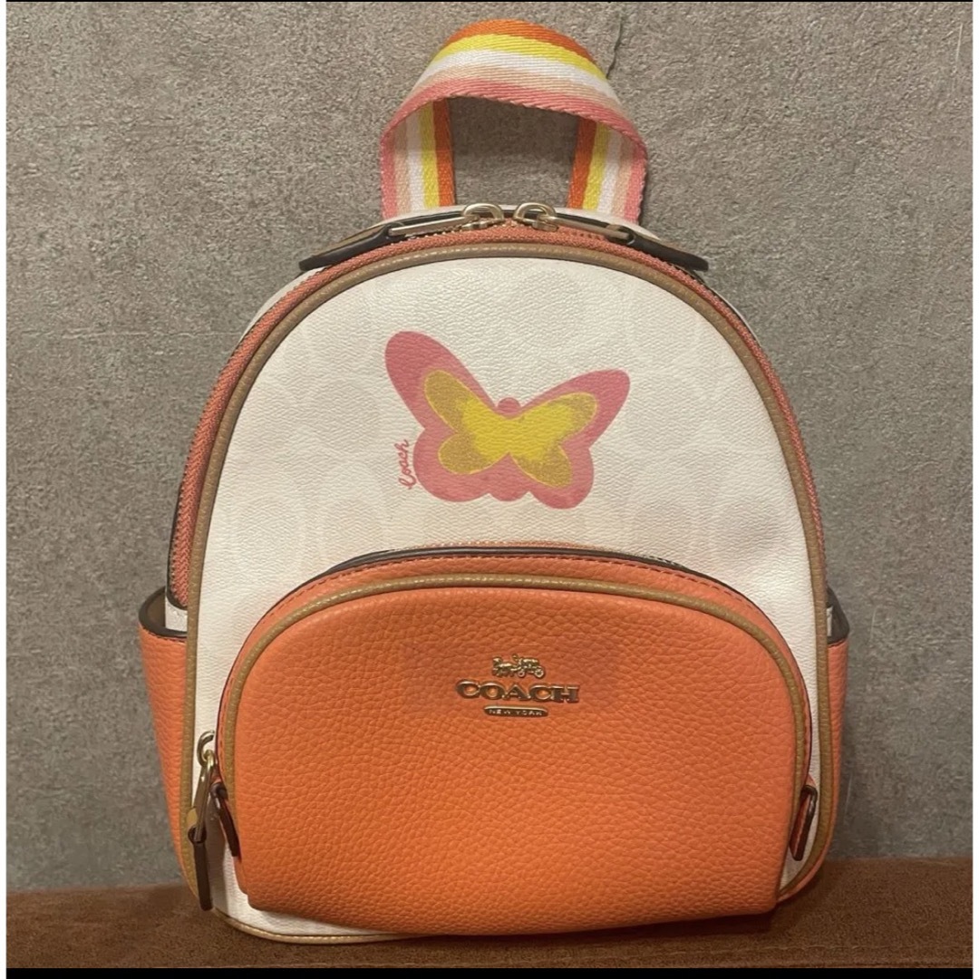 【人気商品‼︎】COACH  ミニリュック　ワンポイント　蝶々　ピンク