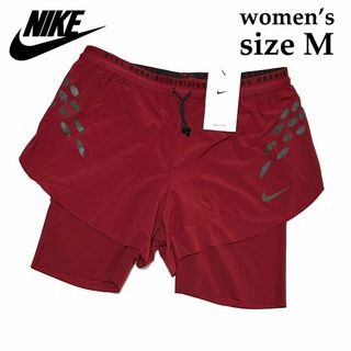 ナイキ(NIKE)の新品　Ｍサイズ　ナイキ　ウィメンズ 2イン1 ランニング ショートパンツ レッド(ショートパンツ)