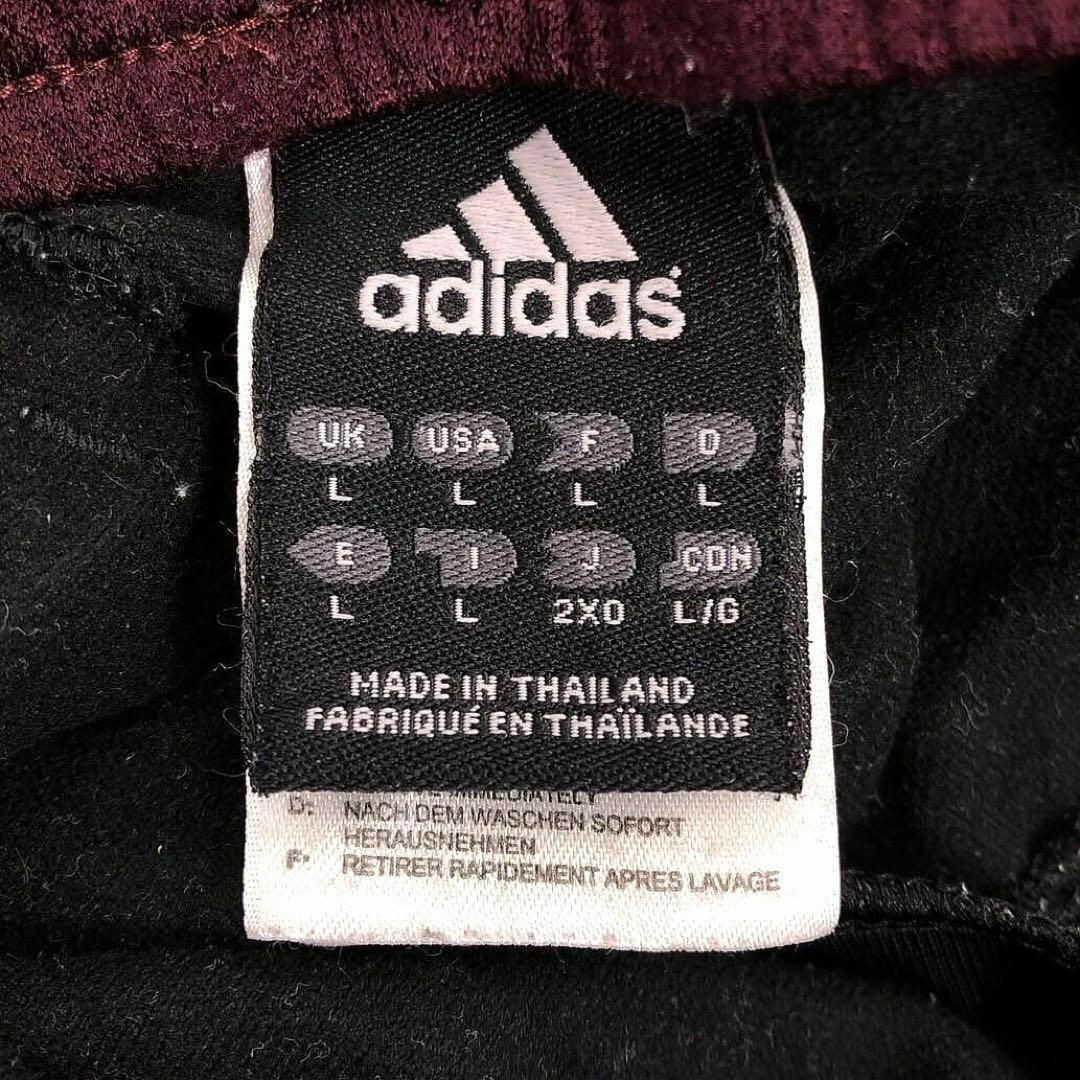 adidas(アディダス)のアディダス サイドライン ジャージ パンツ スリーストライプ ワンポイントロゴ メンズのパンツ(その他)の商品写真