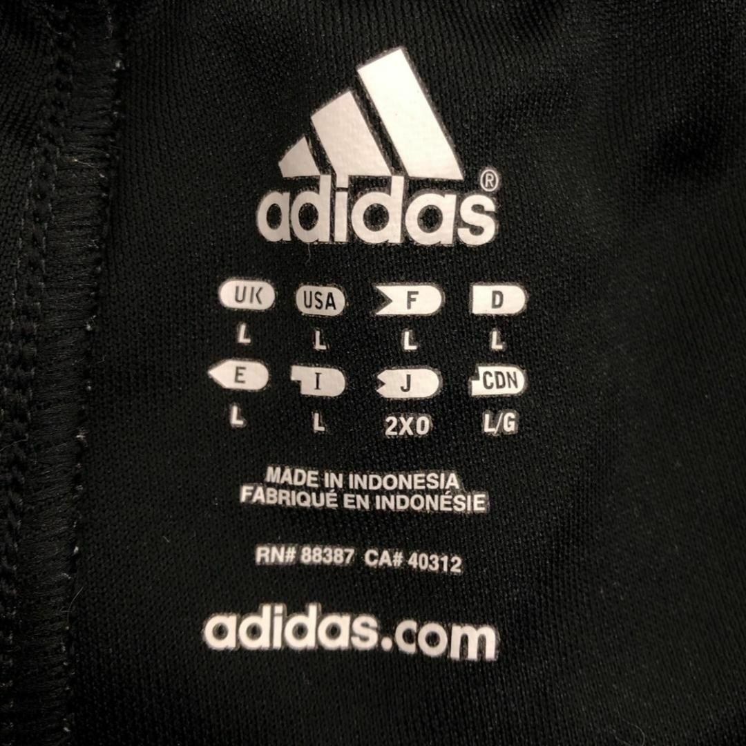 adidas(アディダス)のアディダス ゆるだぼ トラックパンツ ワンポイントロゴ ストライプ 黒 ジャージ メンズのパンツ(その他)の商品写真