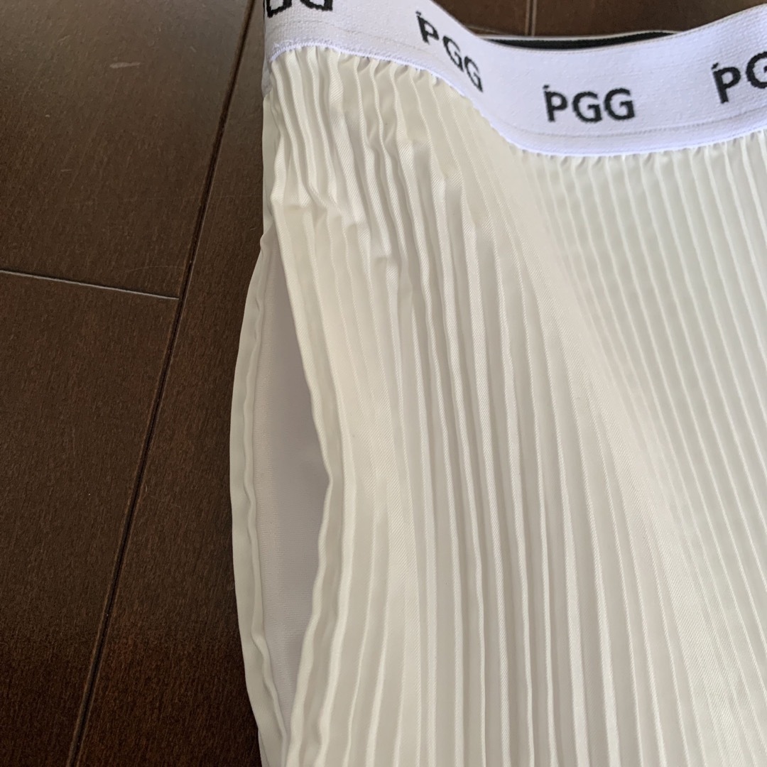 PEARLY GATES(パーリーゲイツ)のパーリーゲイツPGG白プリーツスカートとモックトップスセットアップサイズ1 レディースのレディース その他(セット/コーデ)の商品写真