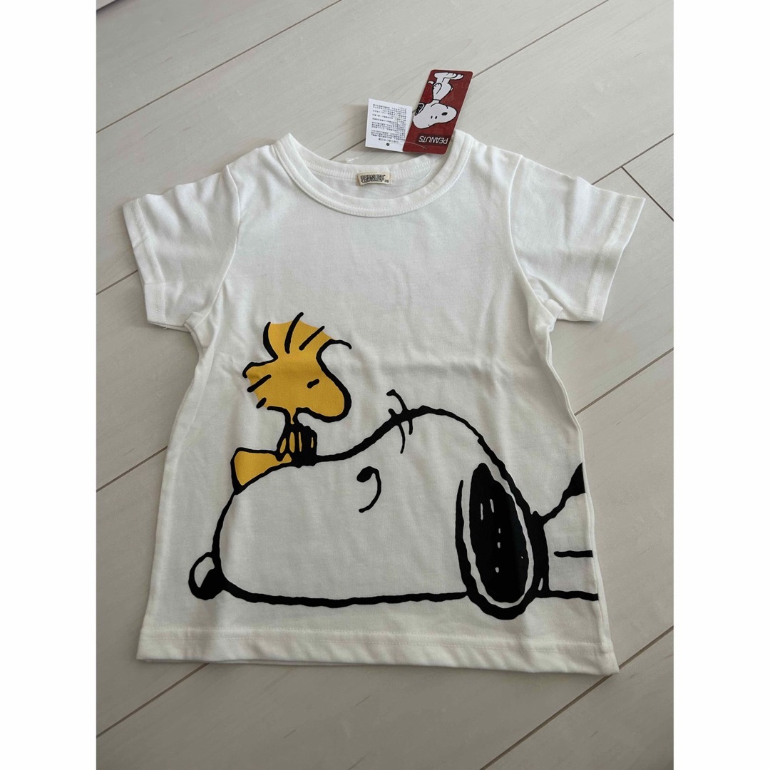 PEANUTS(ピーナッツ)の★新品タグ付き★【PEANUTS】スヌーピー 半袖Tシャツ　110サイズ キッズ/ベビー/マタニティのキッズ服男の子用(90cm~)(Tシャツ/カットソー)の商品写真