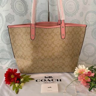 馬車COACH トートバッグ ピンク ベージュ シグネチャー リバーシブル