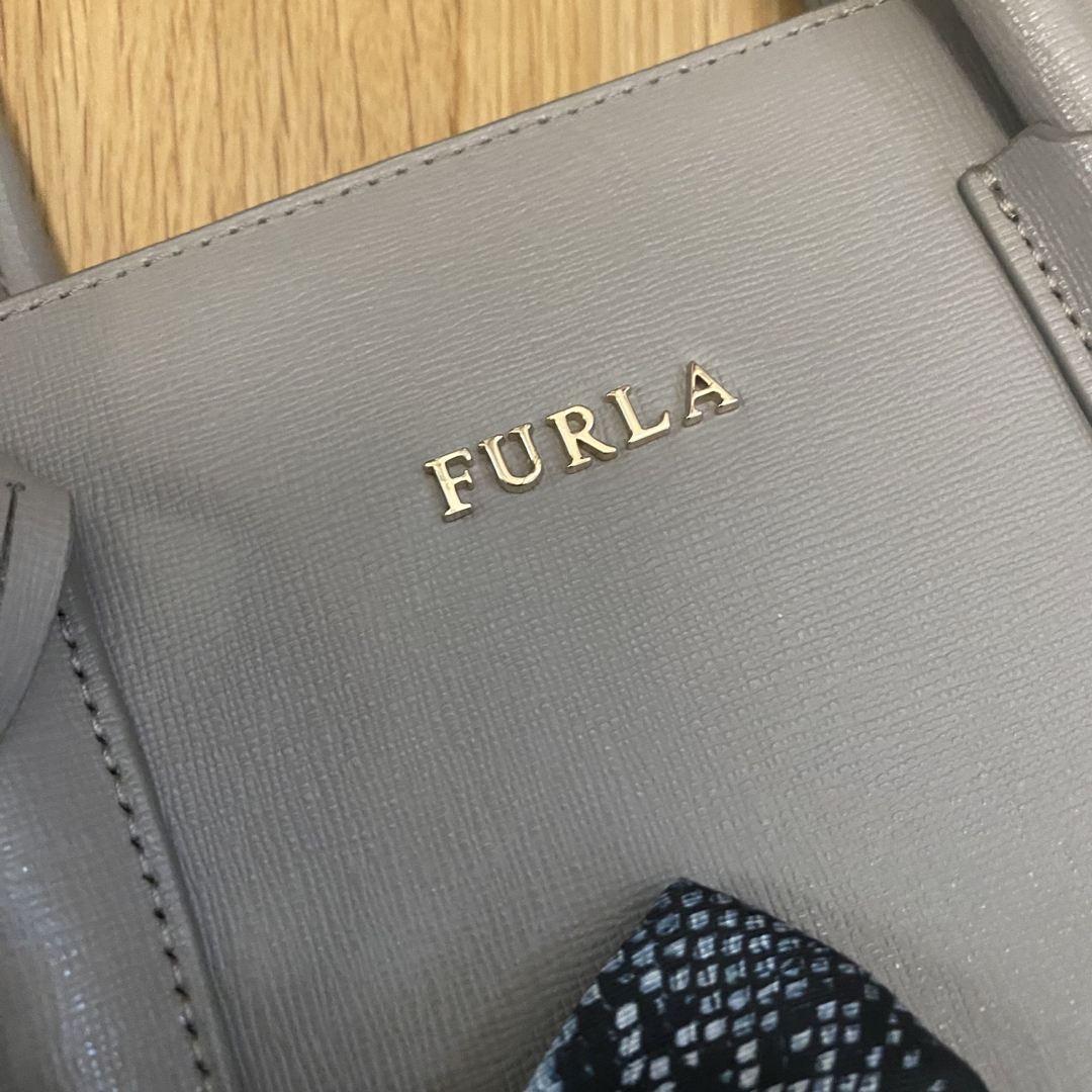 Furla(フルラ)のFURLAトートバッグ　チャーム付き　水色 レディースのバッグ(トートバッグ)の商品写真