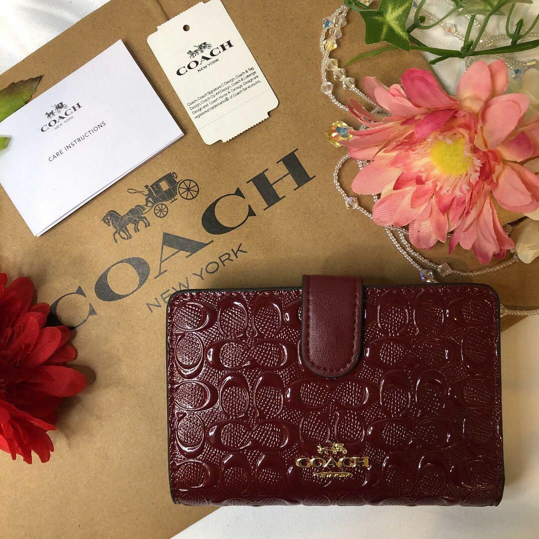 COACH コーチ 二つ折り財布 エンボス エンジ ワインレッド - 財布