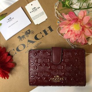 コーチ(COACH)のCOACH コーチ 二つ折り財布 エンボス エンジ ワインレッド(財布)