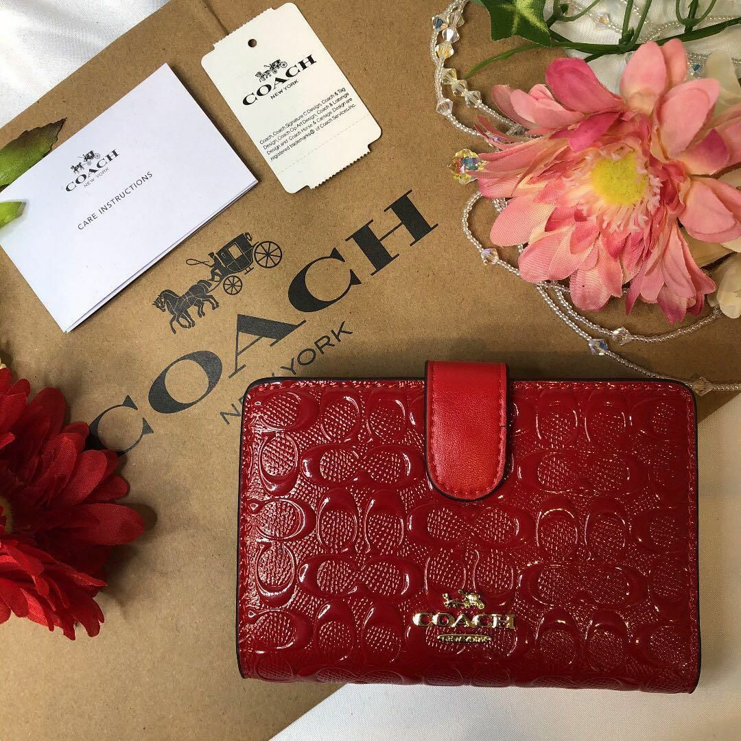 COACH コーチ 二つ折り財布 レッド エンボス加工