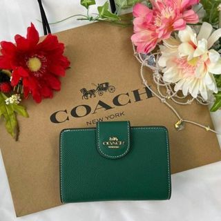 COACH コーチ 二つ折り財布 ブラウン ブラック ボタンロゴ