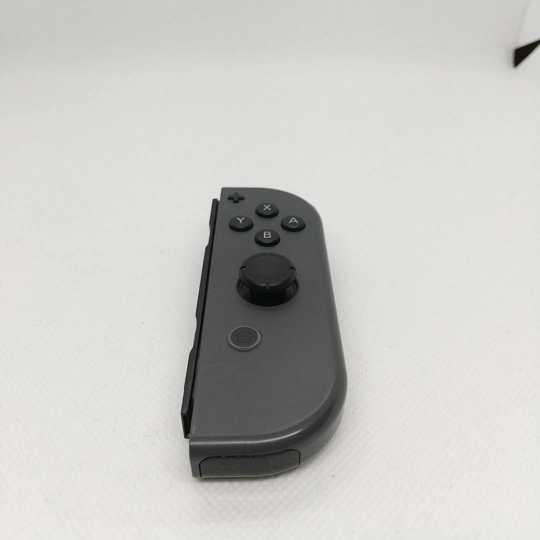 Nintendo Switch(ニンテンドースイッチ)の【廃盤】②Switch ジョイコン　グレー　右のみ(R)【任天堂純正品】黒色灰色 エンタメ/ホビーのゲームソフト/ゲーム機本体(家庭用ゲーム機本体)の商品写真