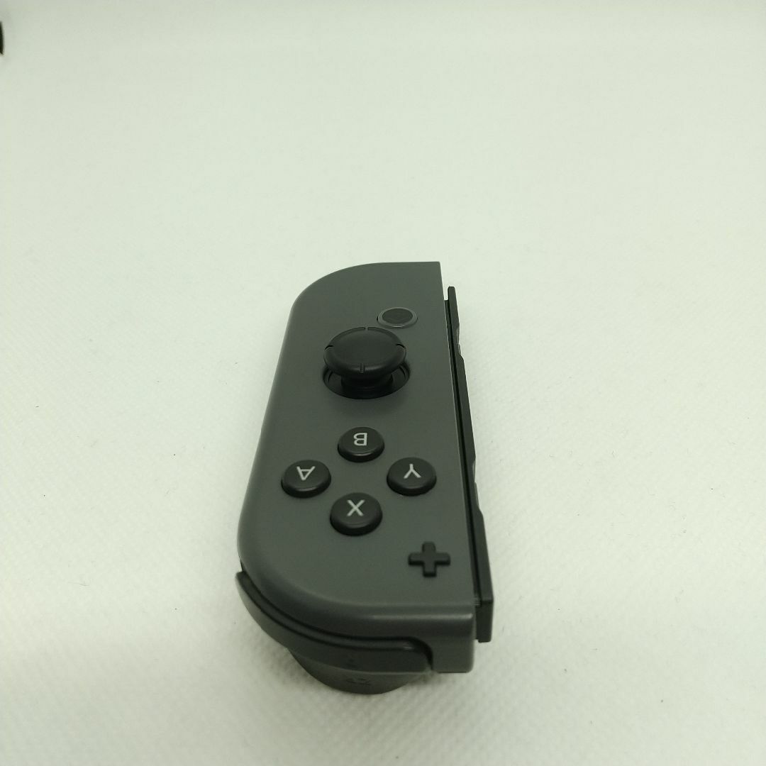 Nintendo Switch(ニンテンドースイッチ)の【廃盤】②Switch ジョイコン　グレー　右のみ(R)【任天堂純正品】黒色灰色 エンタメ/ホビーのゲームソフト/ゲーム機本体(家庭用ゲーム機本体)の商品写真