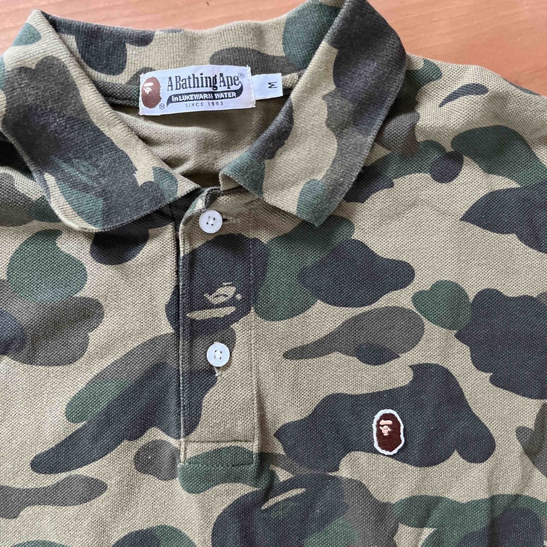 A BATHING APE(アベイシングエイプ)のAPE迷彩ポロシャツ　Mサイズ メンズのトップス(ポロシャツ)の商品写真