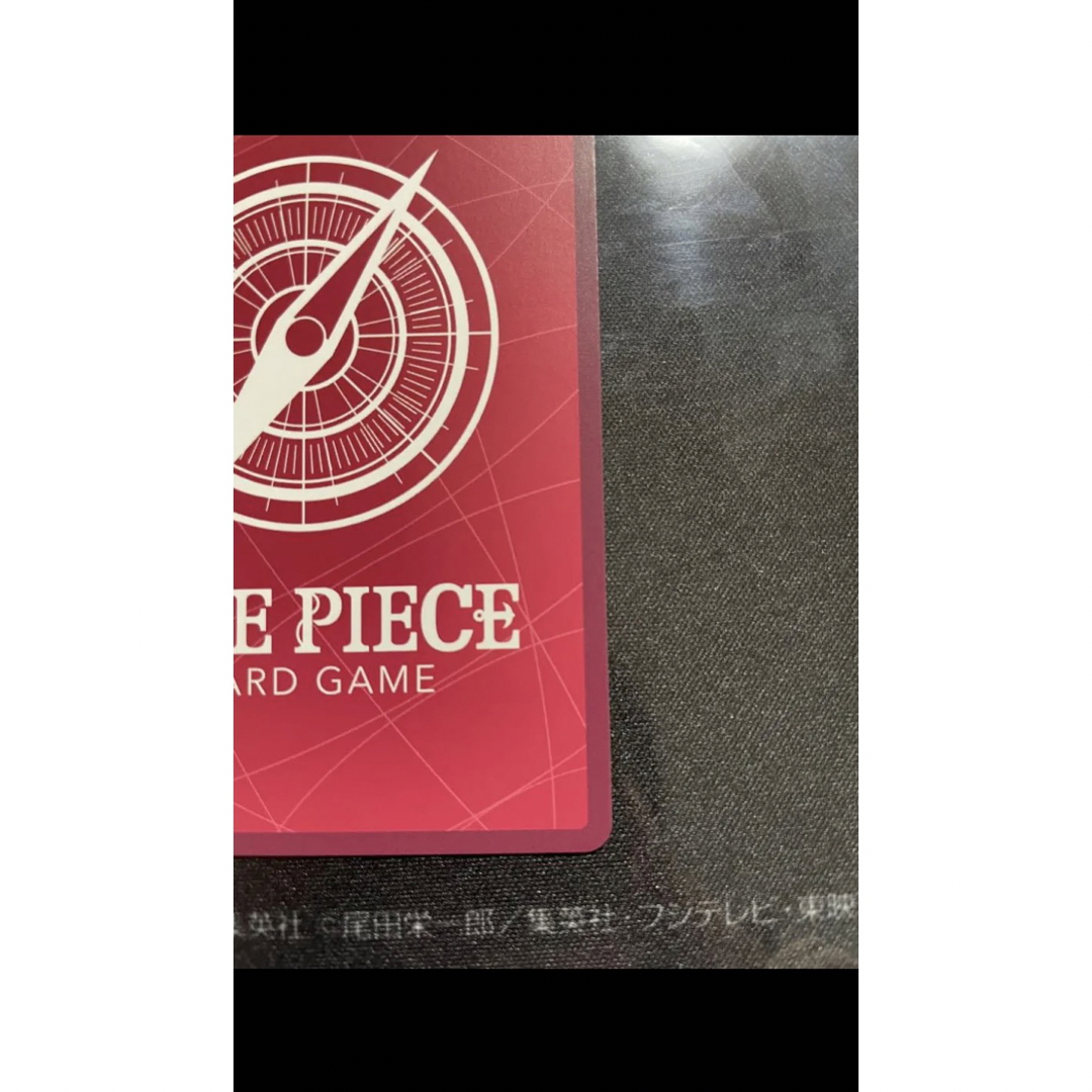 ONE PIECE(ワンピース)のトラファルガー・ロー　リーダー　パラレル　ワンピースカード　ローダー付き エンタメ/ホビーのトレーディングカード(シングルカード)の商品写真