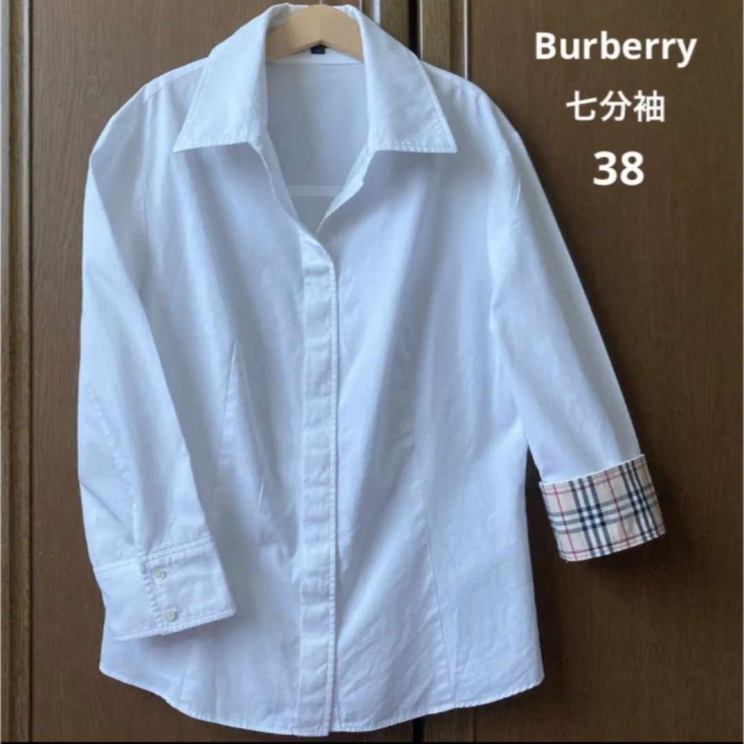 BURBERRY(バーバリー)のバーバリー　七分袖　シャツ　ブラウス　白　お袖　折り返し　チェック　春　夏　 レディースのトップス(シャツ/ブラウス(長袖/七分))の商品写真