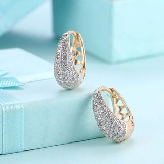 オロリナ 18K フラワークロスピアス