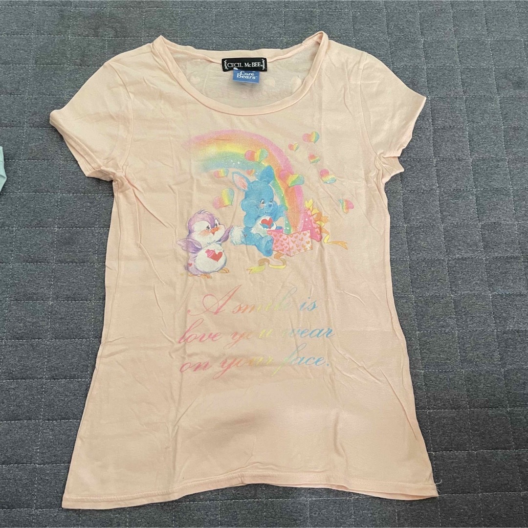 CECIL McBEE(セシルマクビー)のセシルマクビー×ケアベア　コラボ　Tシャツ レディースのトップス(Tシャツ(半袖/袖なし))の商品写真