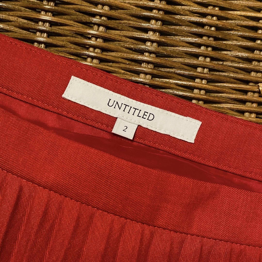 UNTITLED(アンタイトル)のUNTITLED アンタイトル 洗える　アコーディオンプリーツスカート 赤レッド レディースのスカート(ひざ丈スカート)の商品写真