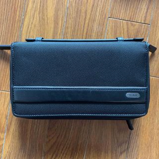 トゥミ(TUMI)のTUMI DOUBLE ZIP AROUND CLUTCH BLACK(長財布)