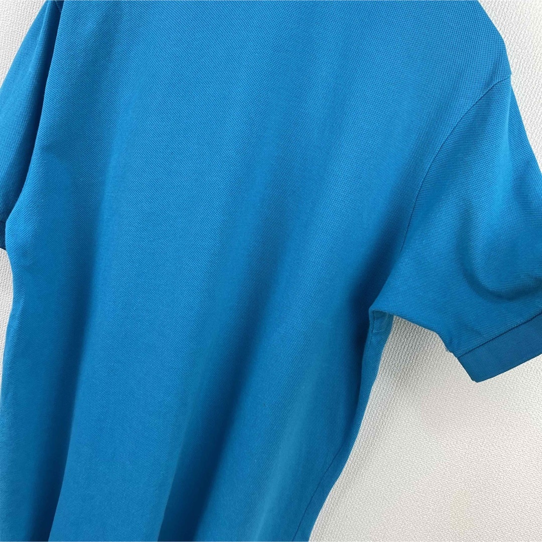 LACOSTE(ラコステ)のLACOSTE IZOD ラコステ　ポロシャツ　ライトブルー　M 古着 メンズのトップス(ポロシャツ)の商品写真
