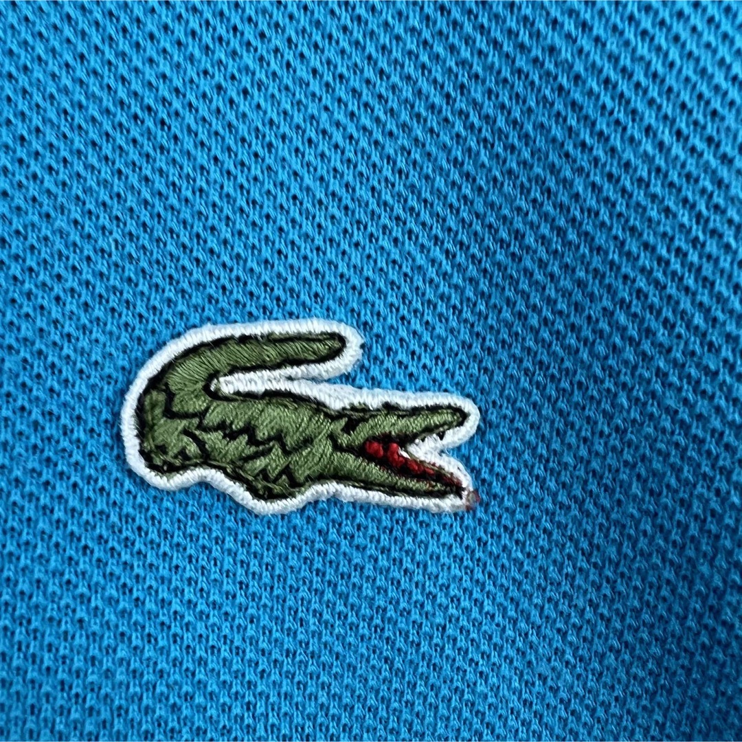 LACOSTE(ラコステ)のLACOSTE IZOD ラコステ　ポロシャツ　ライトブルー　M 古着 メンズのトップス(ポロシャツ)の商品写真