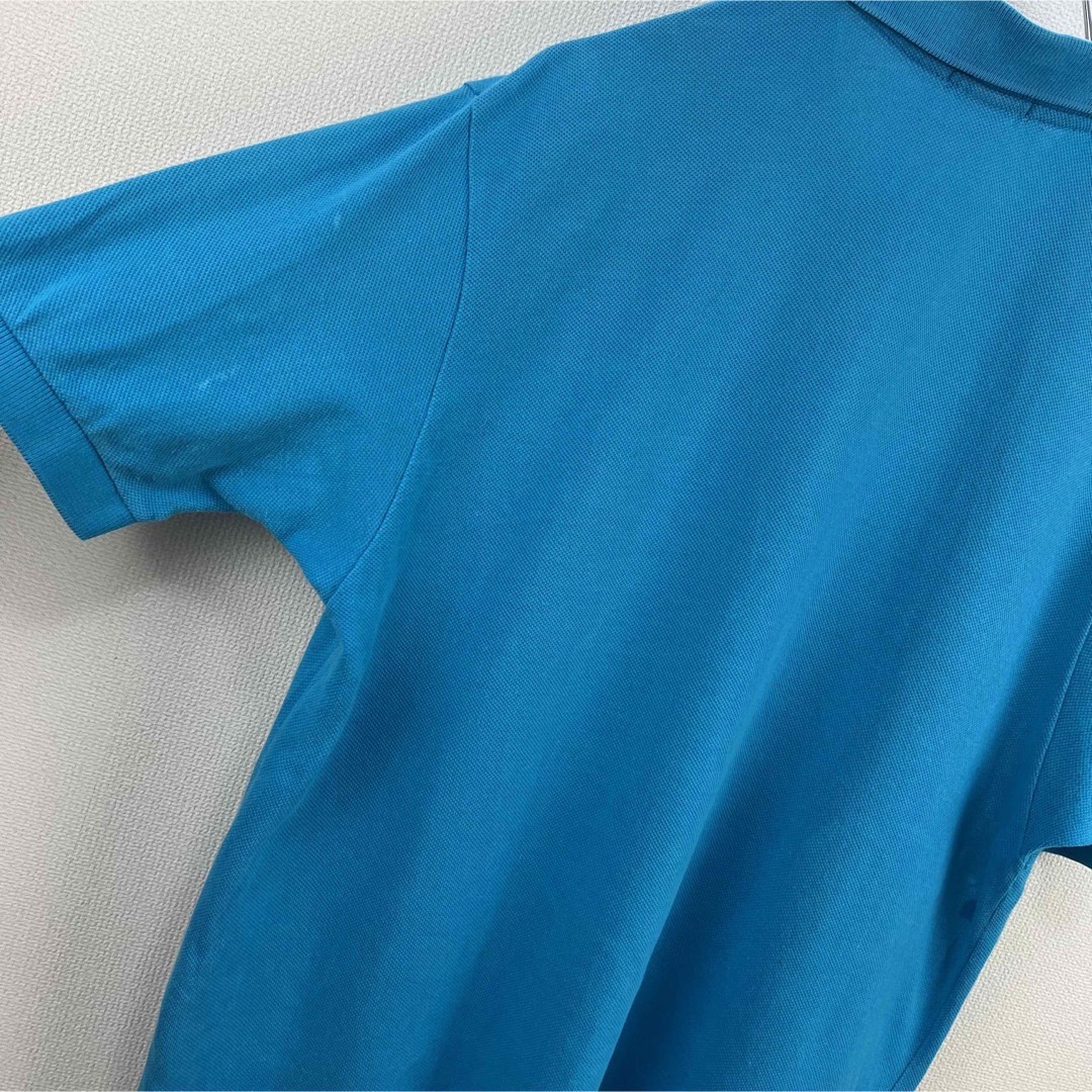 LACOSTE(ラコステ)のLACOSTE IZOD ラコステ　ポロシャツ　ライトブルー　M 古着 メンズのトップス(ポロシャツ)の商品写真