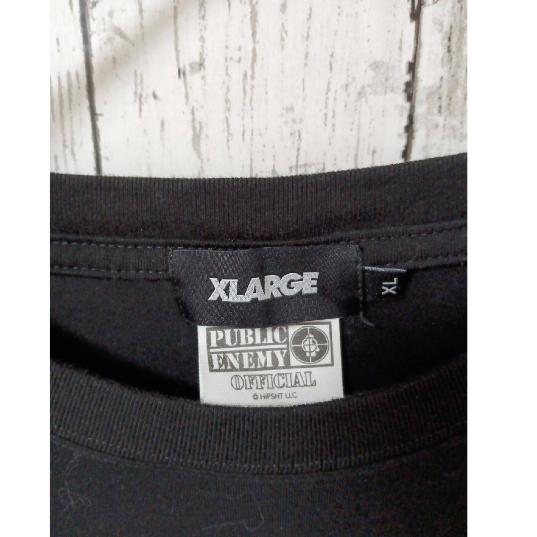 XLARGE(エクストララージ)のパブリックエネミー×エクストララージ　Tシャツ コラボ　ブラック　XLサイズ メンズのトップス(Tシャツ/カットソー(半袖/袖なし))の商品写真