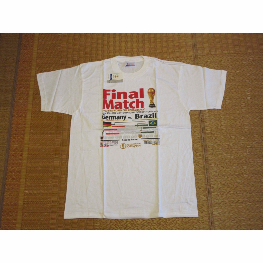 WC2002　決勝記念Tシャツ　未使用品 スポーツ/アウトドアのサッカー/フットサル(記念品/関連グッズ)の商品写真