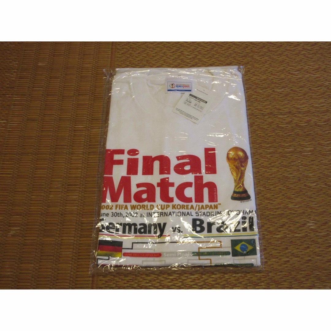 WC2002　決勝記念Tシャツ　未使用品 スポーツ/アウトドアのサッカー/フットサル(記念品/関連グッズ)の商品写真