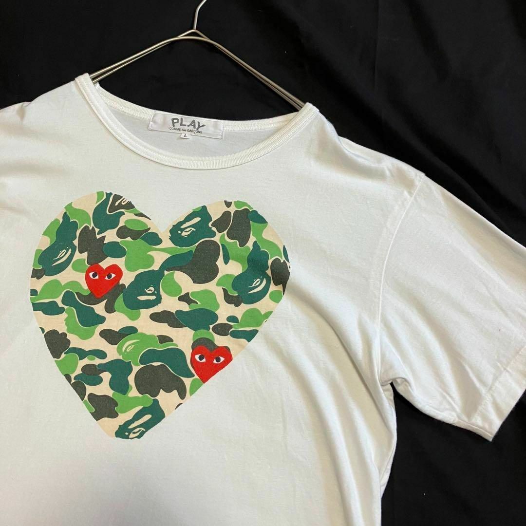 COMME des GARCONS(コムデギャルソン)の【レア】プレイコムデギャルソン　アベイシングエイプ　半袖Tシャツ　コラボ　白　L レディースのトップス(Tシャツ(半袖/袖なし))の商品写真