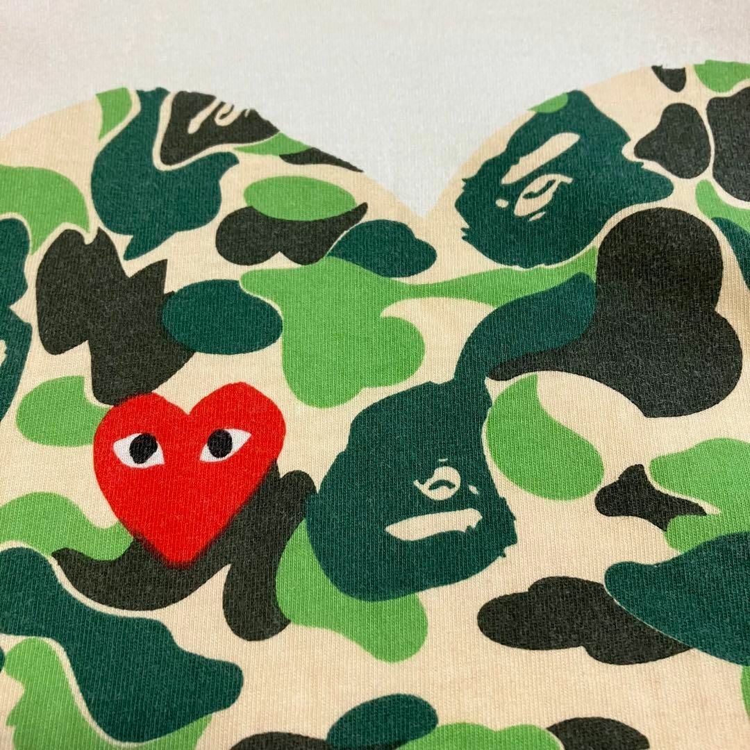 COMME des GARCONS(コムデギャルソン)の【レア】プレイコムデギャルソン　アベイシングエイプ　半袖Tシャツ　コラボ　白　L レディースのトップス(Tシャツ(半袖/袖なし))の商品写真