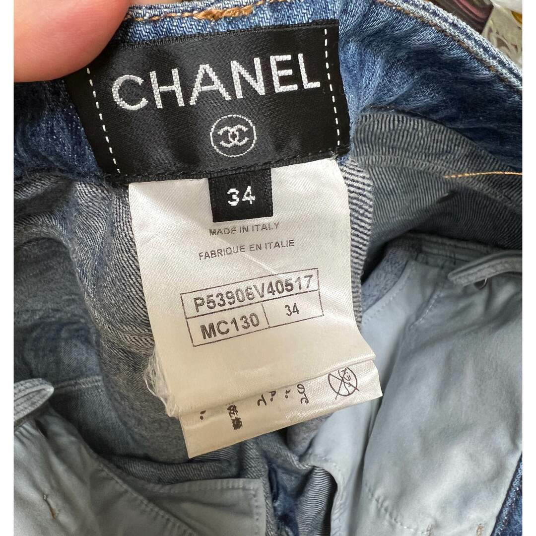 CHANEL(シャネル)のゆかた様専用　CHANEL カメリア柄 総柄 カットオフデニム サイズ34 レディースのパンツ(デニム/ジーンズ)の商品写真