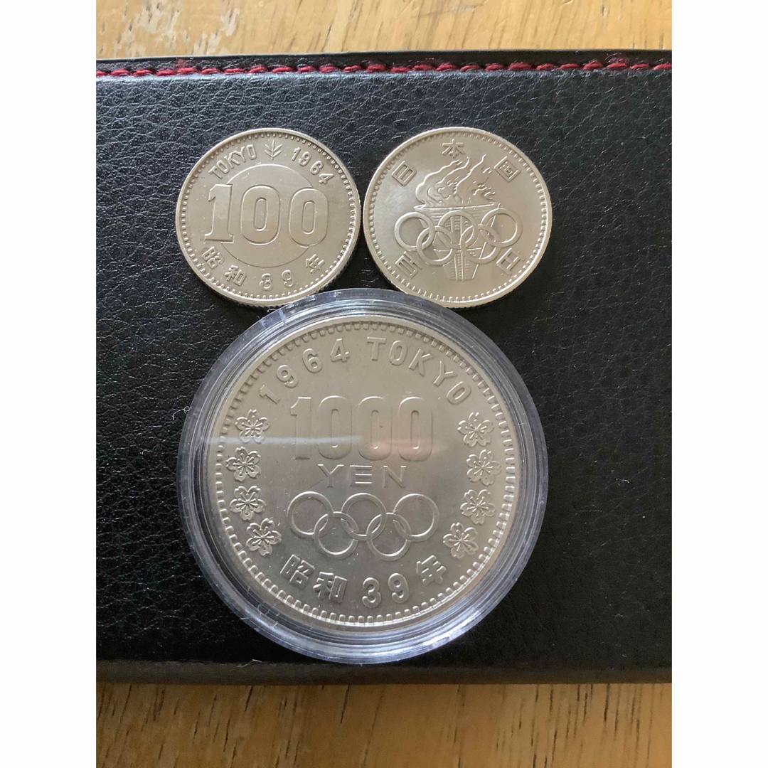 1964年東京オリンピツク記念1000円銀貨2枚。100円銀貨2枚。