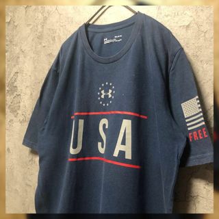 アンダーアーマー(UNDER ARMOUR)の【アンダーアーマー】Msize プリントTシャツ US古着 国旗 USA(Tシャツ/カットソー(半袖/袖なし))