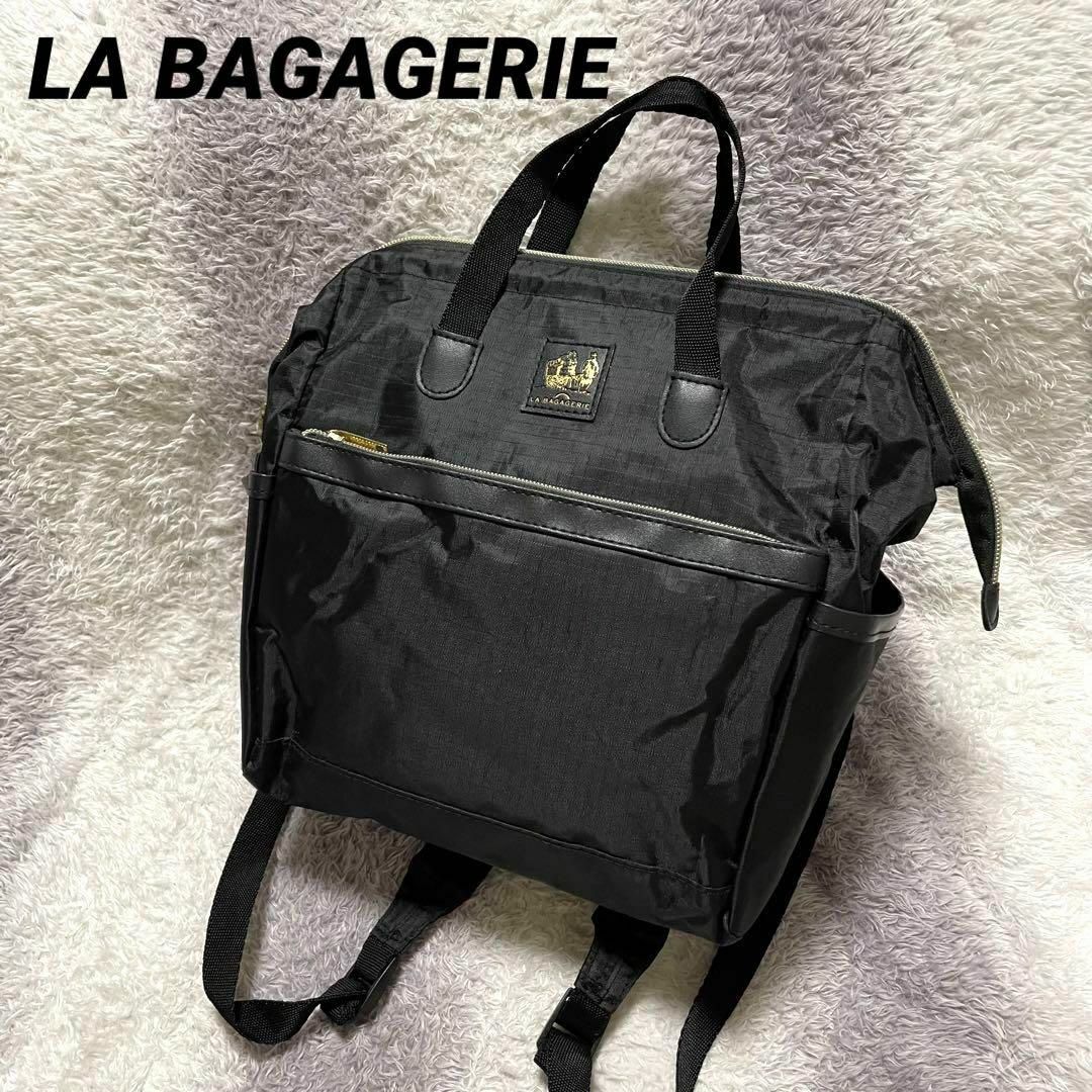 LA BAGAGERIE(ラバガジェリー)のb36c LA BAGAGERIE リュック バックパック がま口 黒×ボルドー レディースのバッグ(リュック/バックパック)の商品写真