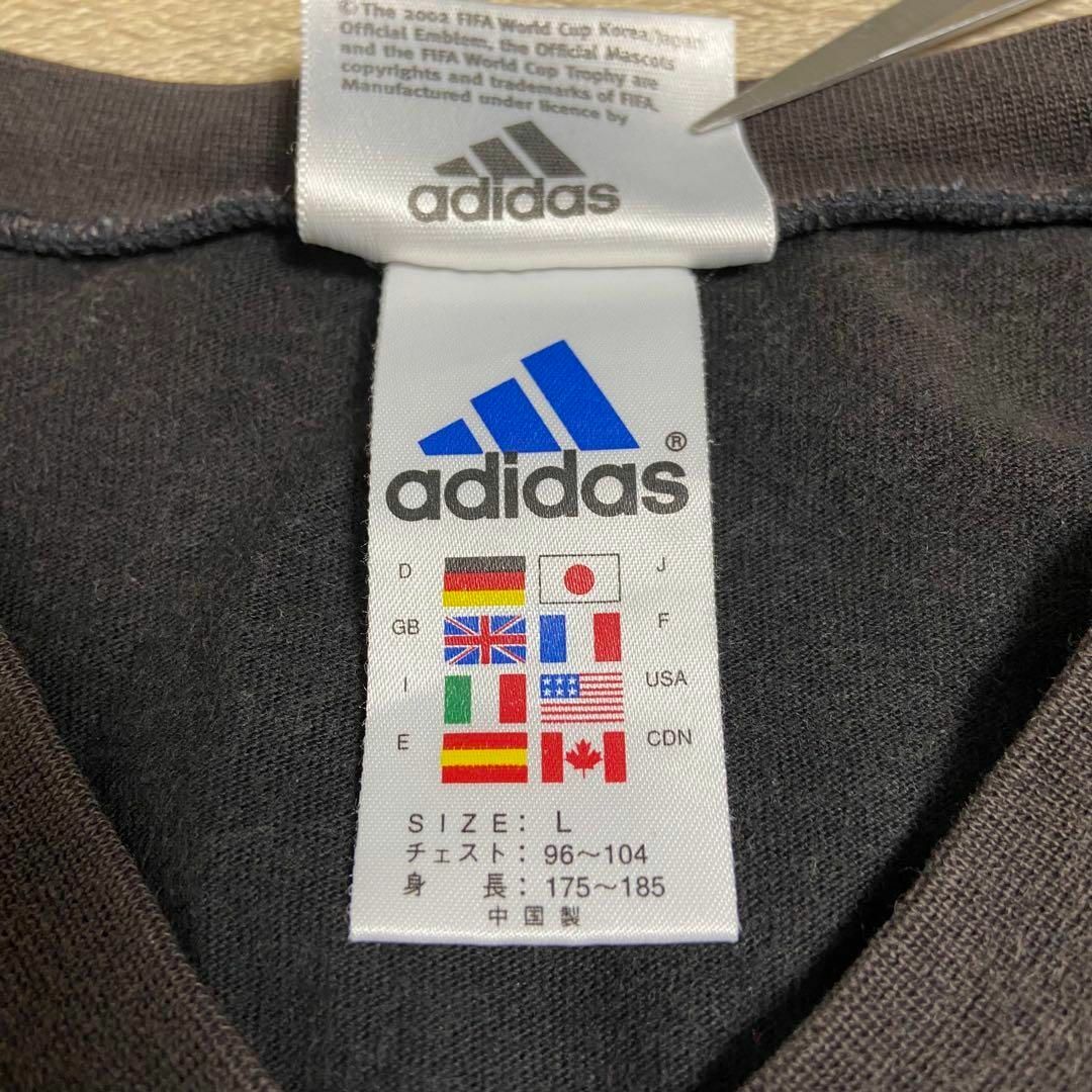 adidas(アディダス)のアディダス　Tシャツ　半袖　男女兼用　古着　黒 メンズのトップス(Tシャツ/カットソー(半袖/袖なし))の商品写真