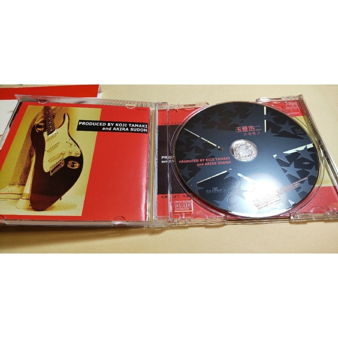 BMG(ベストマートガールズ)の玉置浩二 CD ニセモノ エンタメ/ホビーのタレントグッズ(ミュージシャン)の商品写真
