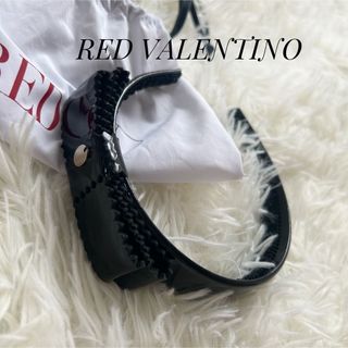 レッドヴァレンティノ(RED VALENTINO)の【美品】RED VALENTINO リボンカチューシャ ヘアアクセサリー 黒(カチューシャ)