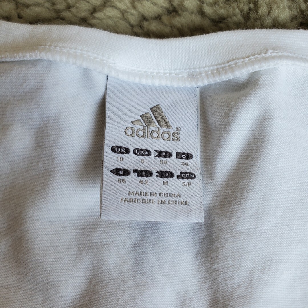 adidas(アディダス)のアディダス　Tシャツ　ヘンリーネック　ラメボタン レディースのトップス(Tシャツ(半袖/袖なし))の商品写真