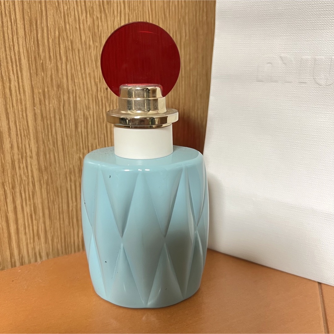 miumiu(ミュウミュウ)のmiumiu ミュウミュウ オードパルファム　ショップ袋付き コスメ/美容の香水(香水(女性用))の商品写真