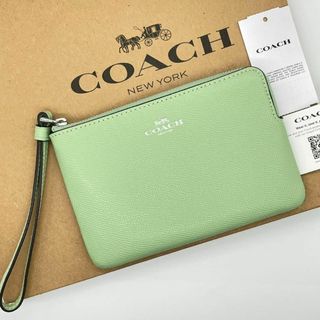 コーチ(COACH)の新品未使用　コーチ　リストレット ストラップ付き ポーチ グリーン(ポーチ)