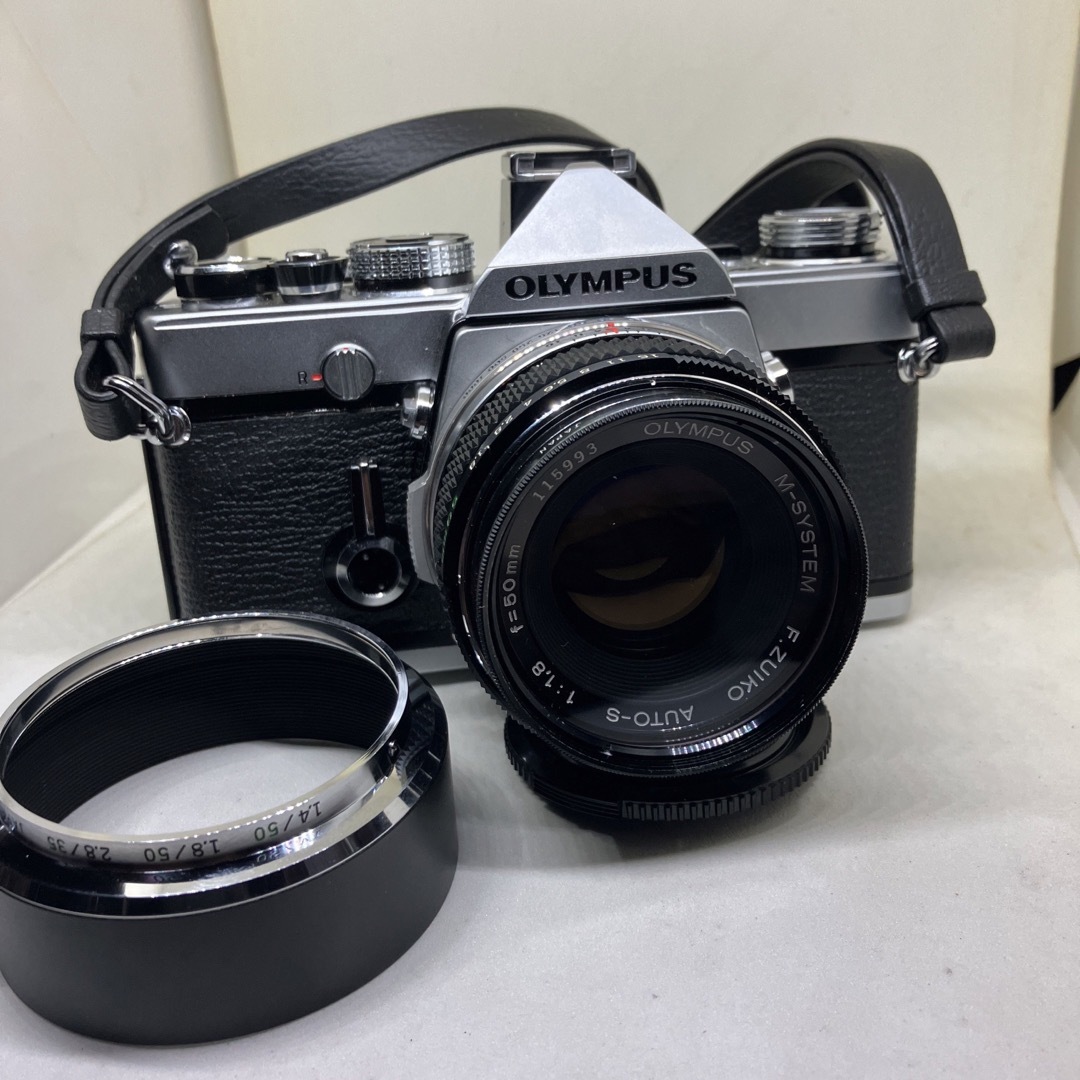 OLYMPUS(オリンパス)のOLYMPUS M-1とM-SYSTEM 50mm F1.8のセットになります。 スマホ/家電/カメラのカメラ(フィルムカメラ)の商品写真