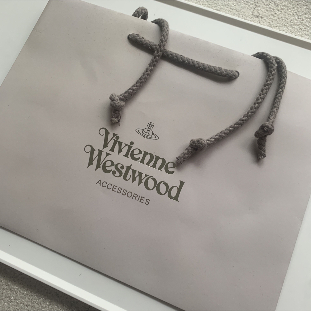 Vivienne Westwood(ヴィヴィアンウエストウッド)の新品 ヴィヴィアンウエストウッド フレーム エナメルレザー 外ファスナー 長財布 レディースのファッション小物(財布)の商品写真