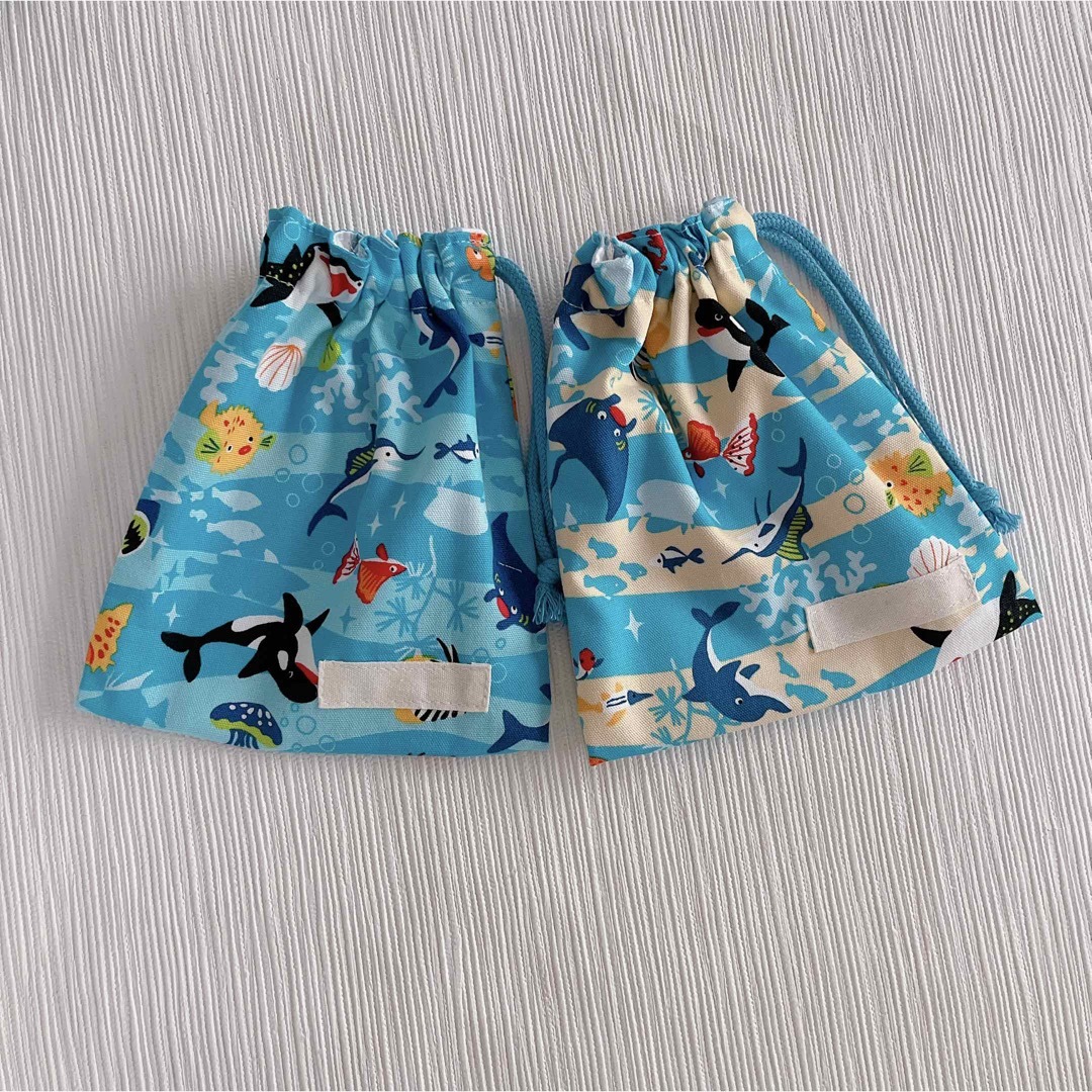 コップ袋 男の子 女の子 魚 熱帯魚 水色 ライトベージュ ハンドメイドのキッズ/ベビー(外出用品)の商品写真