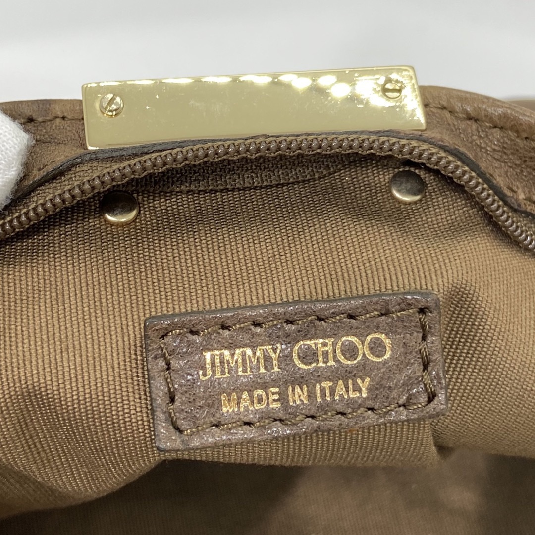 JIMMY CHOO(ジミーチュウ)のジミーチュウ　クラッチバッグ　スタッズ　星座　レザー　ブラウン メンズのバッグ(セカンドバッグ/クラッチバッグ)の商品写真