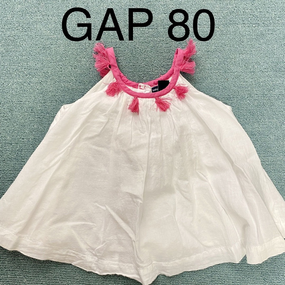 babyGAP(ベビーギャップ)のbaby GAP ピンクフリンジ付きノースリーブトップス80 キッズ/ベビー/マタニティのベビー服(~85cm)(タンクトップ/キャミソール)の商品写真