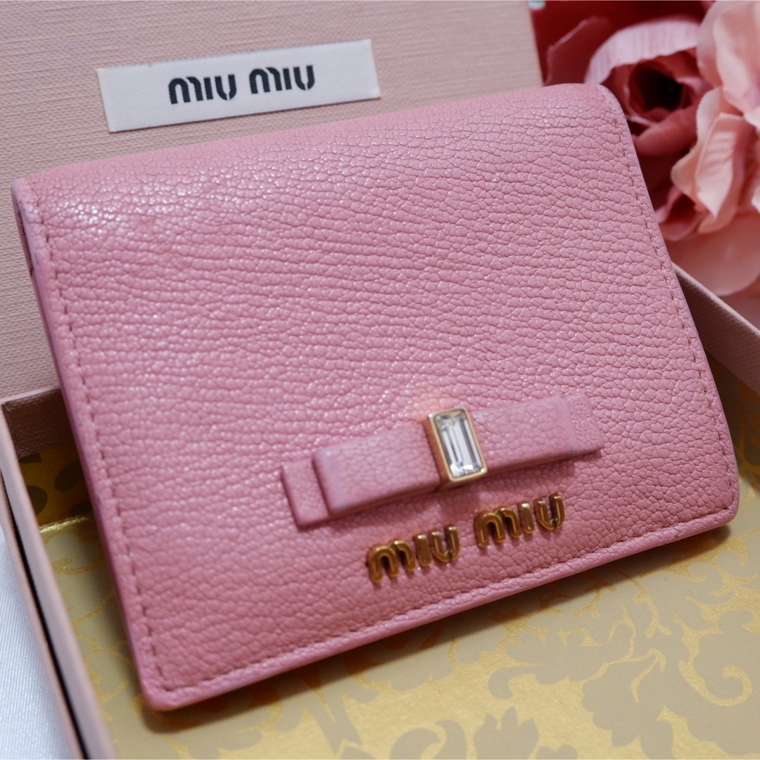 miumiu - ♡美品♥︎ MIUMIU クリスタル 二つ折り財布 リボン ピンクの