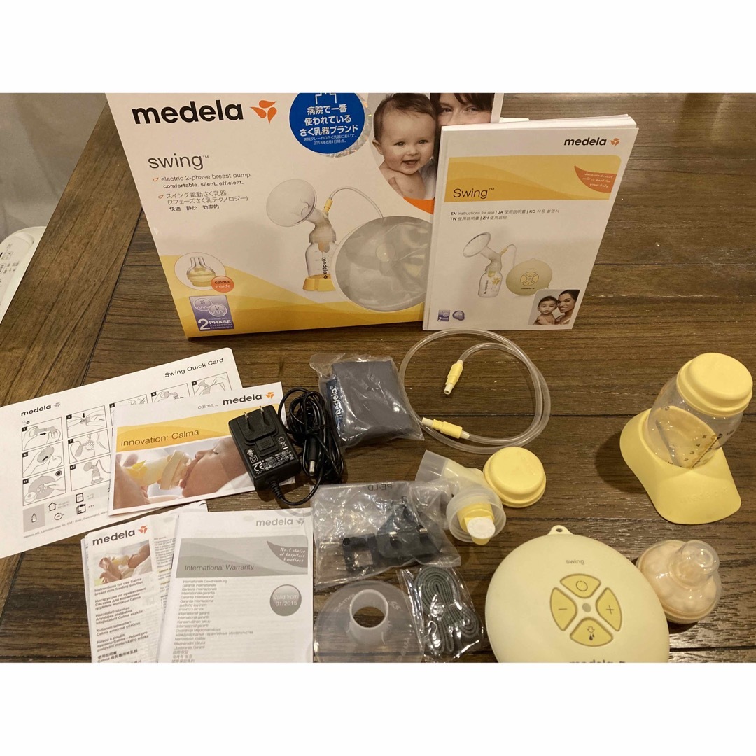 medela(メデラ)のメデラ　スイング電動搾乳機 キッズ/ベビー/マタニティの授乳/お食事用品(その他)の商品写真