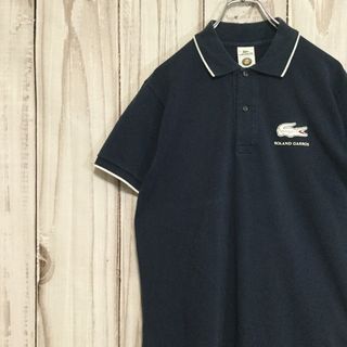 ラコステ(LACOSTE)のラコステ デカワニ 半袖ポロシャツ 襟袖ライン入り M相当 ネイビー 古着(ポロシャツ)