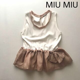 ミュウミュウ(miumiu)のmiumiu ペプラムシルエットカットソー ノースリーブ(Tシャツ(半袖/袖なし))