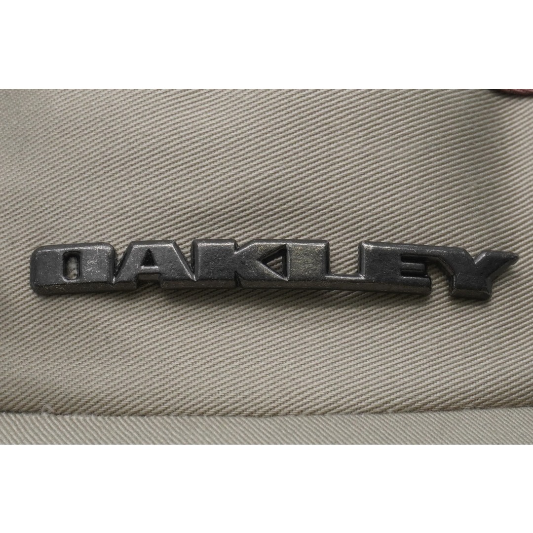Oakley(オークリー)のOakley オークリー サンバイザー ロゴプレート 35460 中国製 コットン ベージュ ブラウン シルバー金具 良品 中古 52022 レディースの帽子(その他)の商品写真