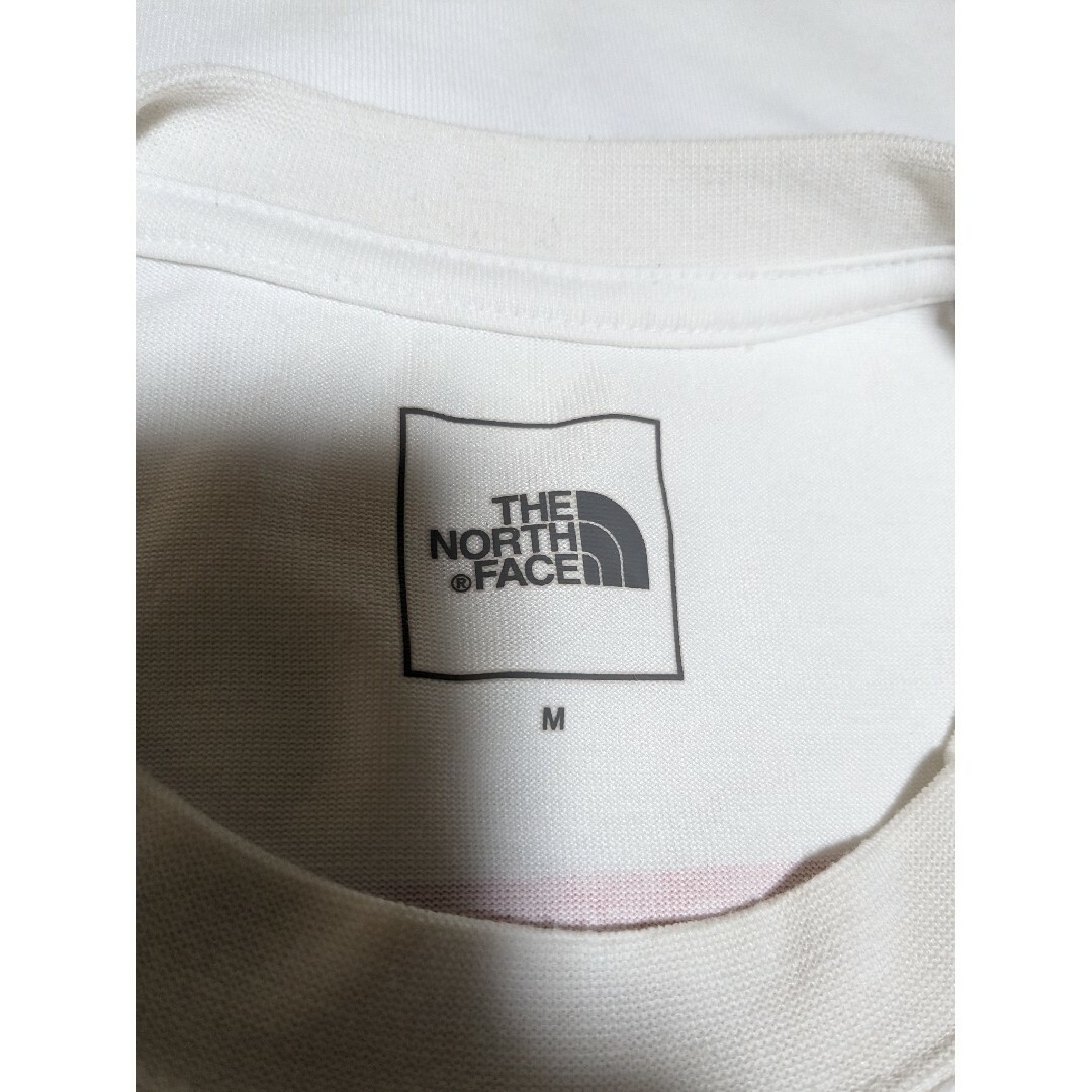 THE NORTH FACE(ザノースフェイス)のノースフェイス ショートスリーブバンダナスクエアロゴティー メンズ Ｍサイズ メンズのトップス(Tシャツ/カットソー(半袖/袖なし))の商品写真